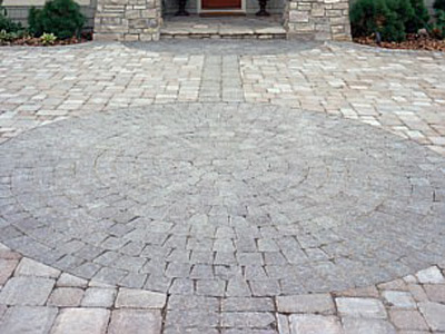 Permeable pavers manage rainwater while creating a finished surface for walking