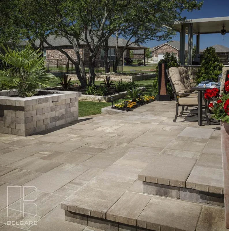 Backyard with stone patio and outdoor seating area
